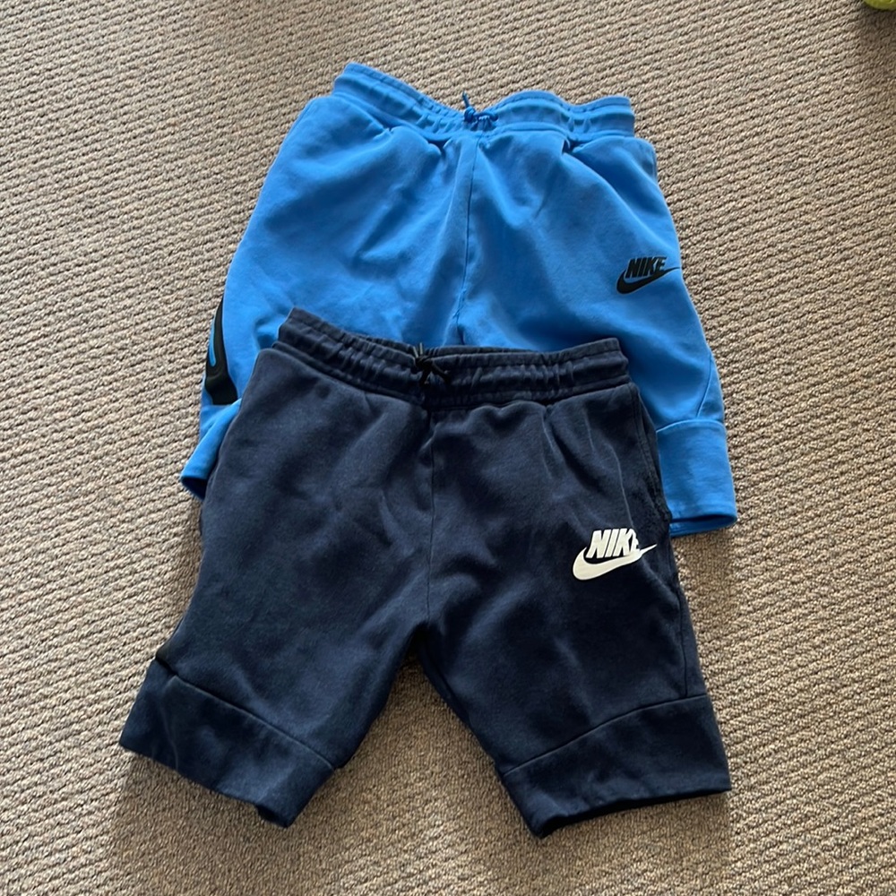 2 Nike boys tech shorts. Size large.